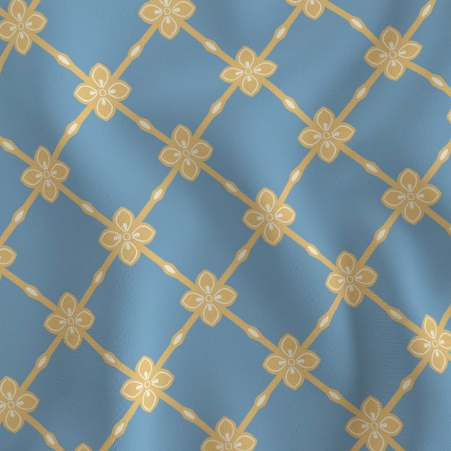 Fabric in Monet trellis green mist yellow and French blue designed by Gabrielle Marlow