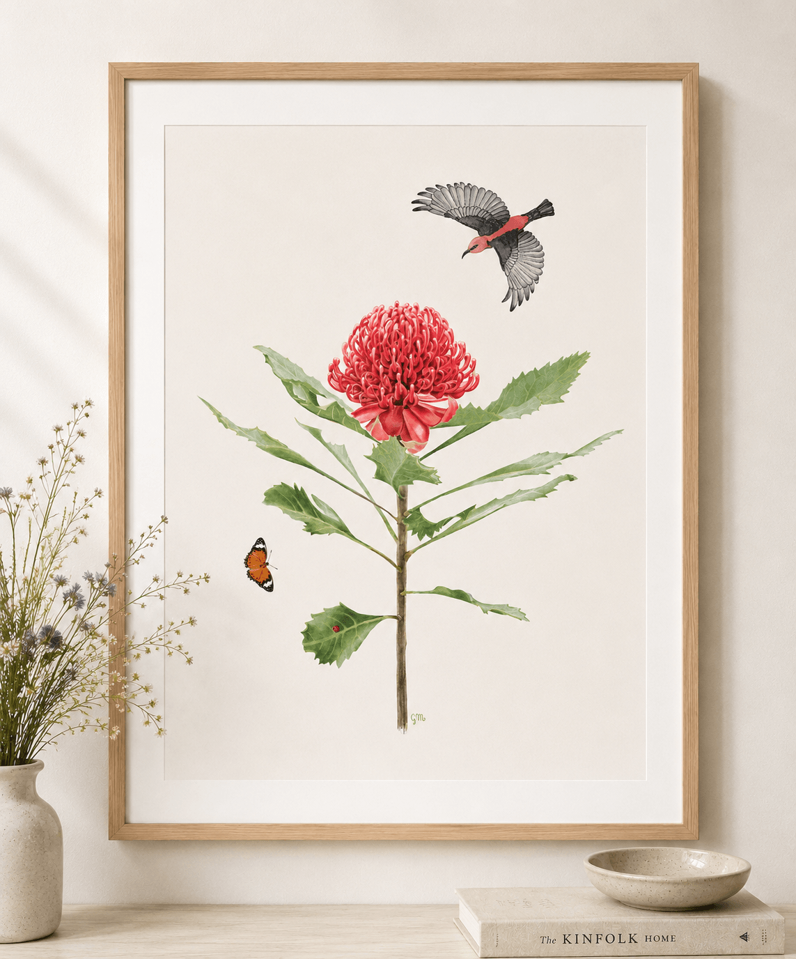 Framed Australian waratah watercolour art print with scarlet honeyeater bird and butterfly, above a console table